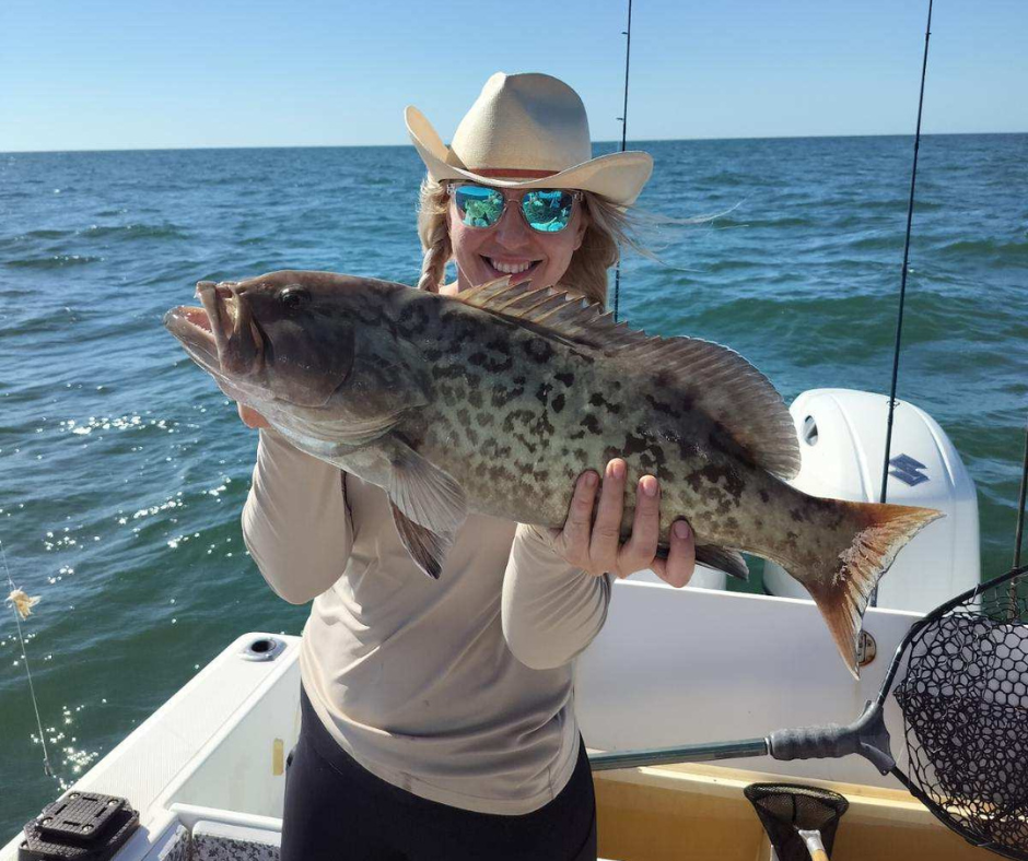 woman holding fish